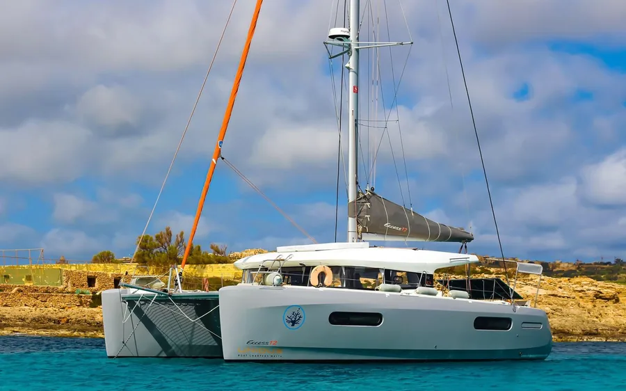 A luxury catamaran moored off the Maltese coast